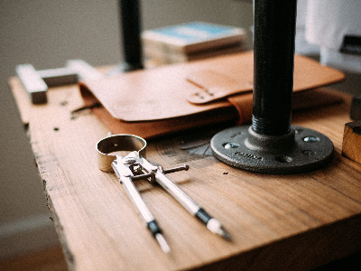 A compass on a desk
